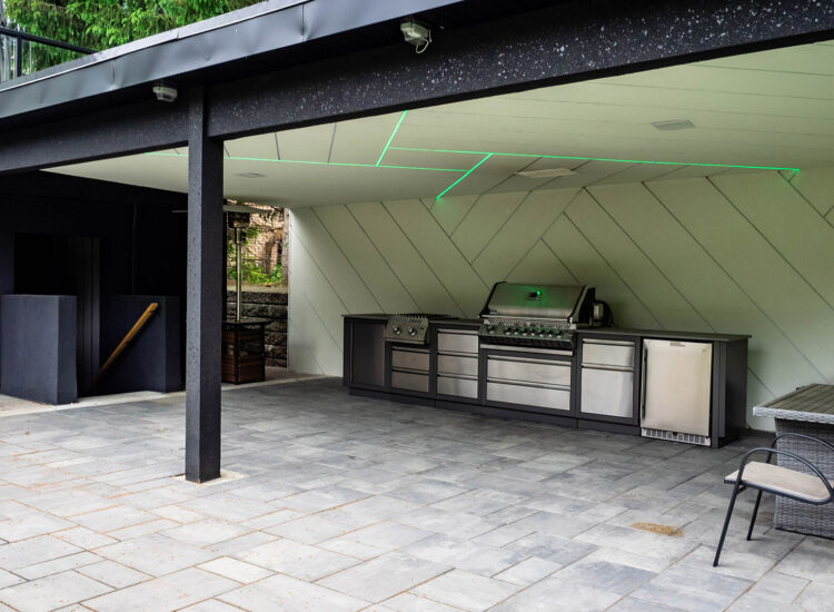 Cabana custom construction with custom led ceiling lighting, stucco finish with reveals, and stone interlock flooring