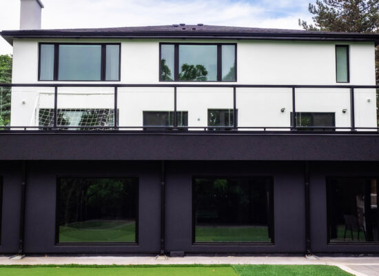 Custom balcony terrace above custom indoor pool