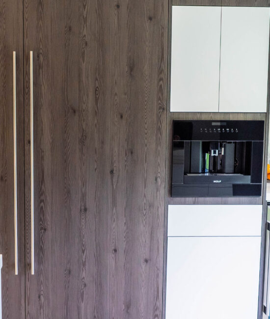 Rivera-Construction-Kitchen-Cabinetry Custom kitchen cabinetry in wood finish with white accents